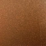 Close-up of a textured brown surface.