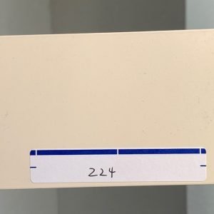 Shelf labeled with number 224 in black ink.