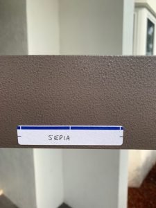 Label with 'Sepia' on textured surface.