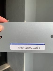 Label reads 'anodized silver' on metallic surface.
