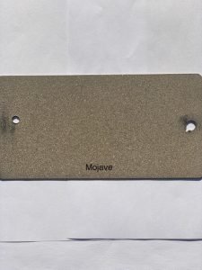Rectangular metallic swatch labeled 'Mojave' with two holes.