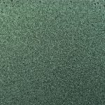 Green textured surface with small speckles.